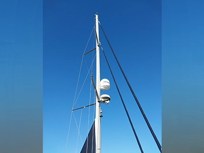 Installation of an Intellian satellite TV dome on a 49’ Hunter | Nicholson Marine Services